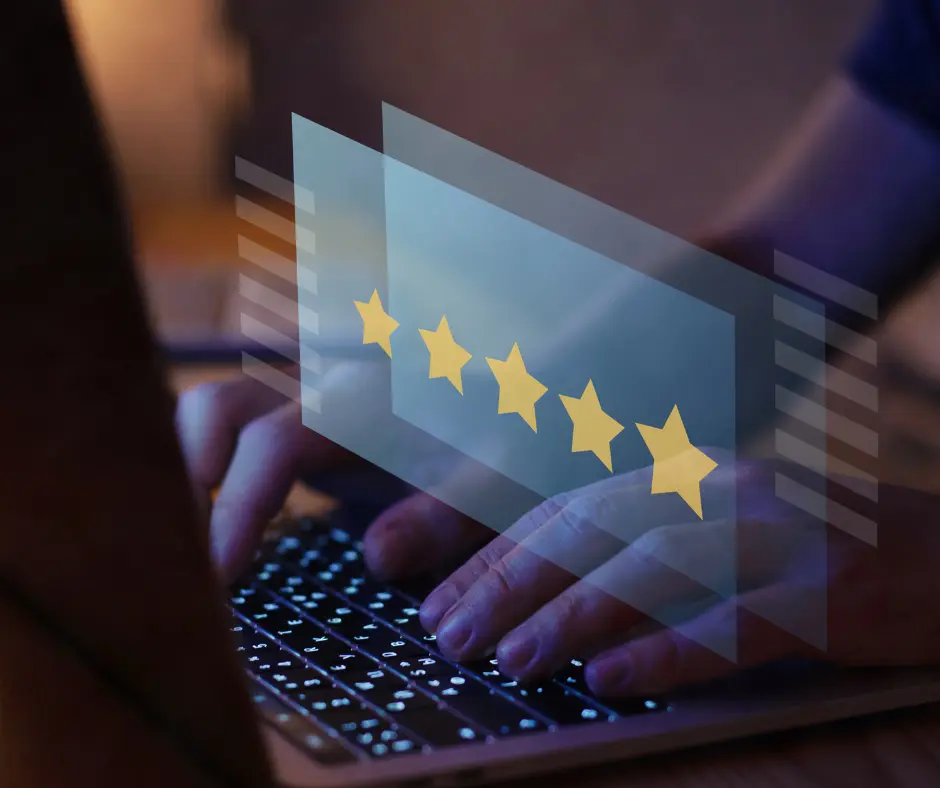 5 star reviews in a reflection from computer monitor
