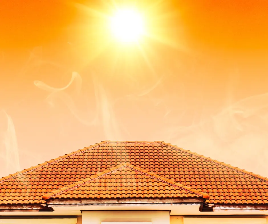 A bright, hot sun over a roof. Roof Maintenance for Summer is important