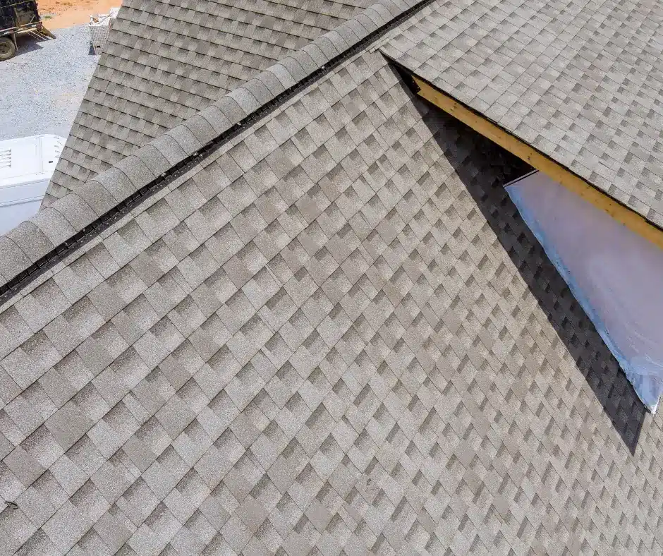 Grey architectural shingles on a new roof.
