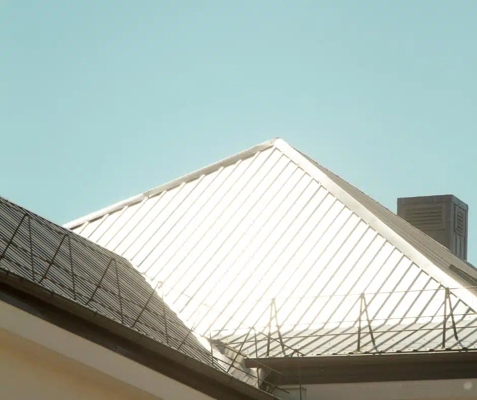 Close-up of standing seam metal roof in sunlight — metal roofing lifespan Winnipeg 40 to 70 years